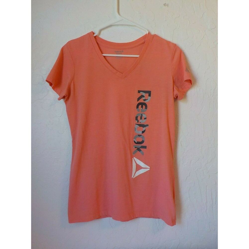 Reebok Orange Sports T-shirt Women Small V-Neck Short Sleeve Spell Out Camo Logo